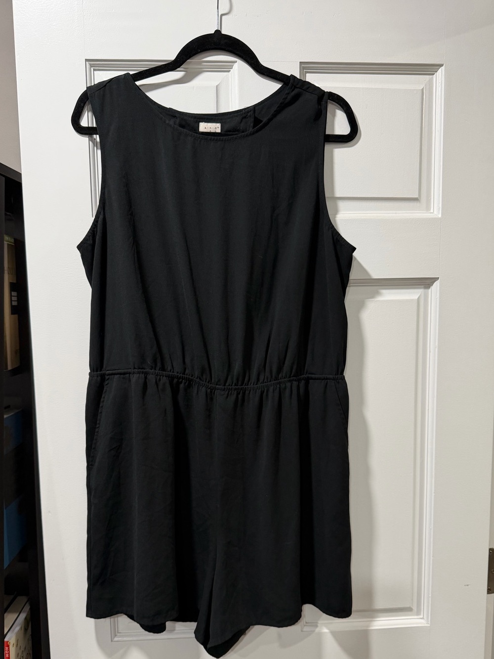 Black Sleeveless Romper with cross key hole open back and pockets